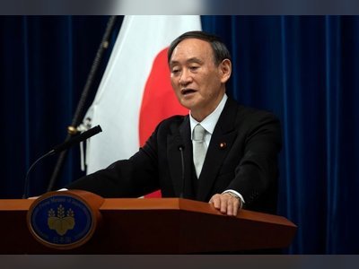 Japan PM Suga trips up with messy reversal on tourism campaign