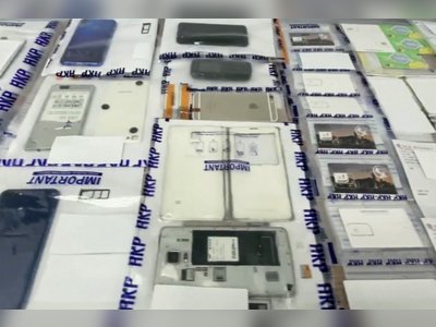 Ten domestic helpers held over bank accounts tied to money laundering