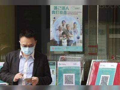 ‘Vaccine hesitancy’ may delay easing of restrictions in Hong Kong, experts warn