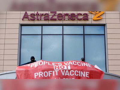 'It is apartheid': Activists blast pharma firms in protest at AstraZeneca's UK HQ over fairer access to Covid-19 jabs
