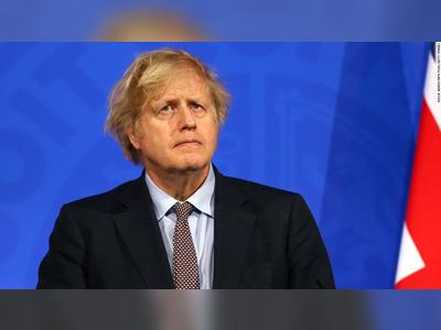 Johnson extends England's pandemic restrictions amid variant concerns