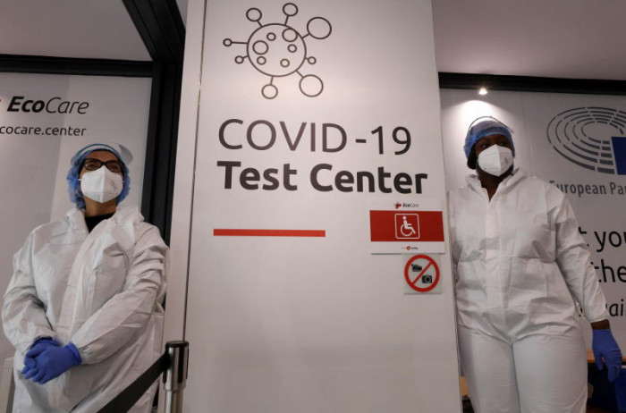 WHO warns against treating Covid-19 like flu