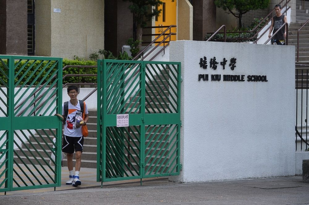 Pui Kiu Middle School suspends classes after parent tests preliminary positive