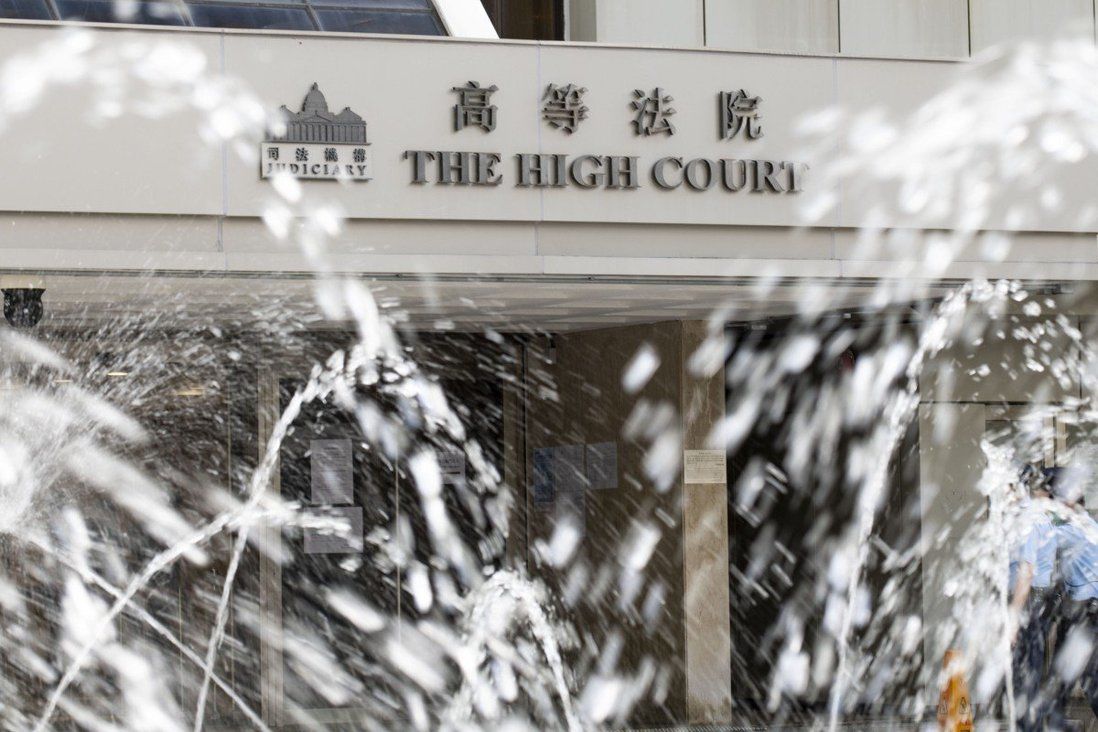 Hong Kong judge reopens police investigation into complaints of forced labour