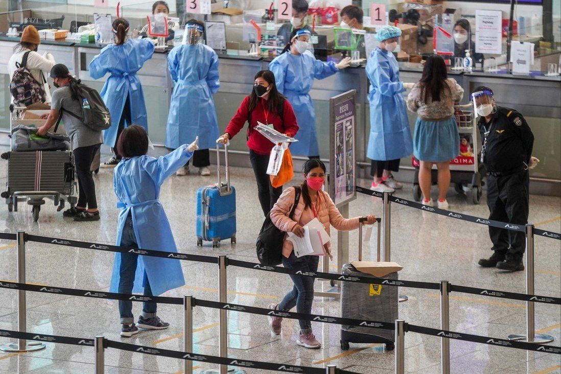 First foreigners flying into Hong Kong after entry rules eased express relief