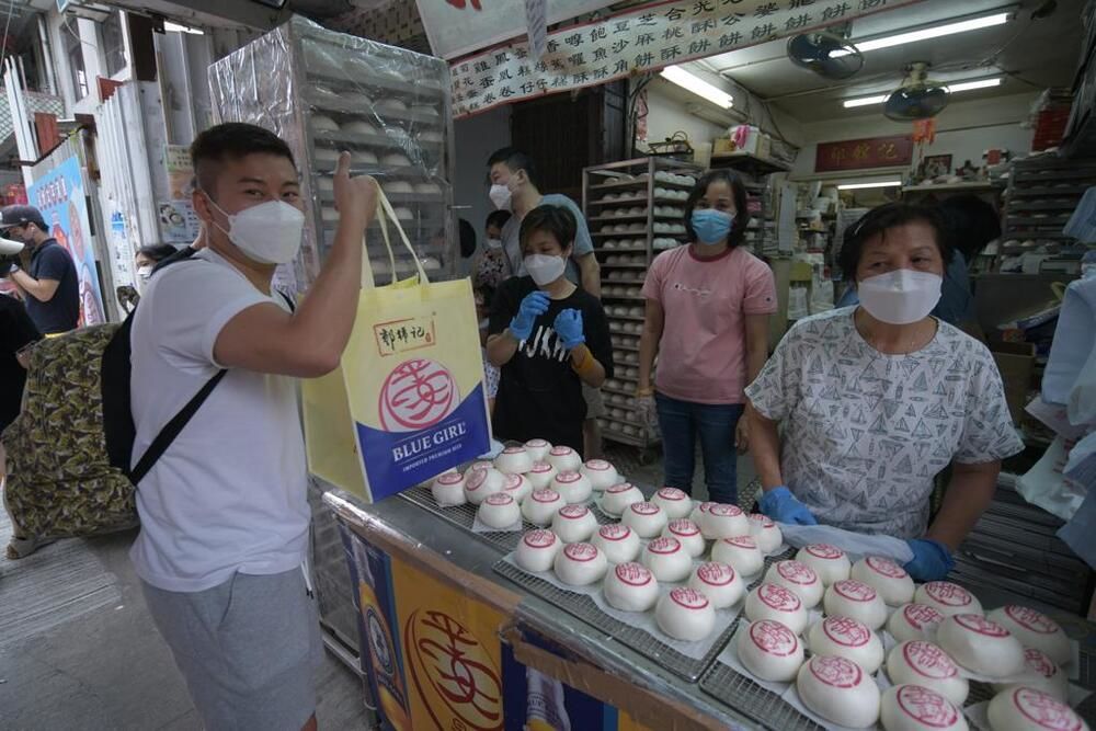 Thousands flock to Cheung Chau for Ping On buns as Buddha's Birthday met Mother's Day