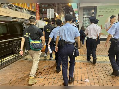 Police cluster monitored as HK sees 1,276 Covid cases