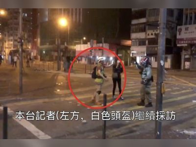 Police rejection of complaint by Hong Kong reporter hit by sponge grenade upheld