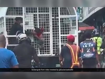 Shocking Video Shows Child Hanging from Back of Immigration Control Truck in Dominican Republic